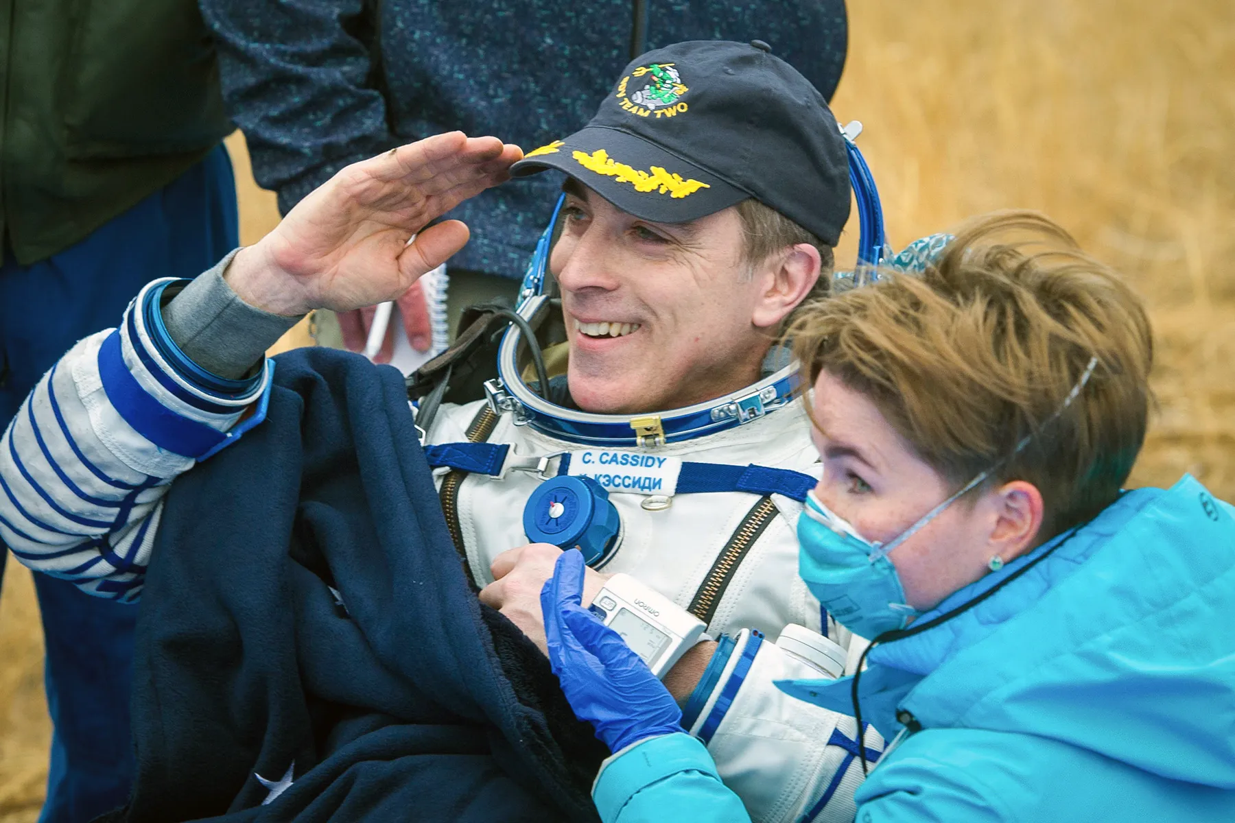 NASA Astronaut and Navy SEAL Chris Cassidy being assisted by recovery teams shortly after his Soyuz MS-16 spacecraft landed in a remote area of Kazakhstan.