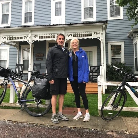 Chris and Peggy at home with bicycles